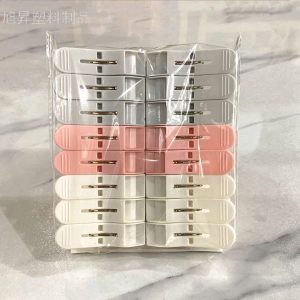 16 PINCES A LIGNE EN PLASTIQUE